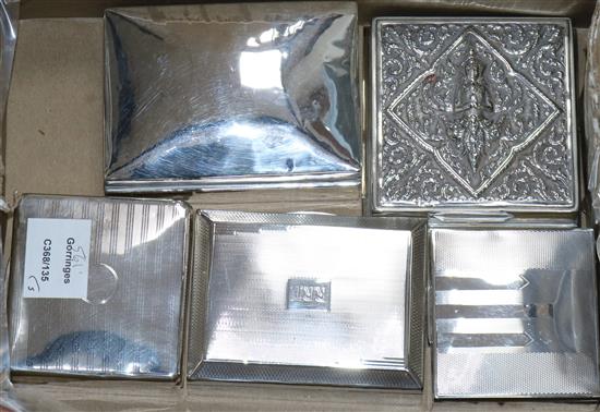 Five assorted silver cigarette boxes, largest 12.8cm.